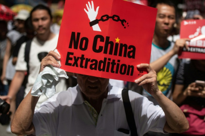 Hong Kong businesses pledge closures as extradition anger builds.jpg