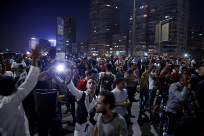 Demonstrators clash with Egyptian security forces in rare anti-Sisi protests.jpg