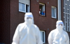 Germany reimposes virus lockdowns, Djokovic tests positive.jpg