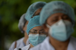 Russia accused of vaccine hacking as Brazil crosses 2 million cases.jpg