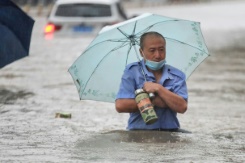 Severe rainstorms kill 12 in flooded China subway