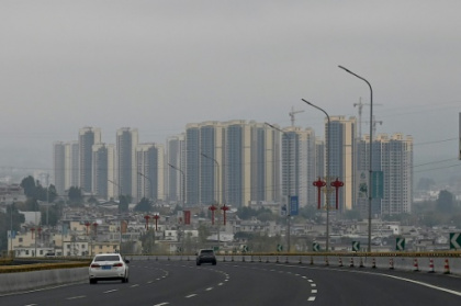 China to expand property tax trial to check speculation.jpg