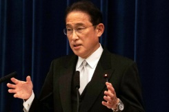 Japan unveils record $490 bn stimulus to boost pandemic recovery.jpg