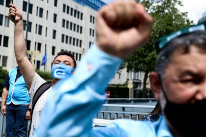 US hits China with new trade curbs, sanctions over Uyghur rights.jpg