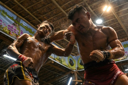 Myanmar traditional boxing packs a punch, kick and headbutt.jpg