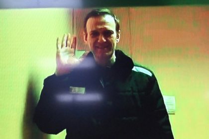 Russia's Navalny faces decades in prison in new trial.jpg