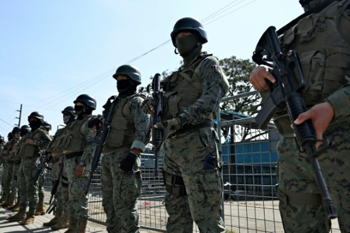 Ecuador forces wrest back control of prison as riot death toll climbs
