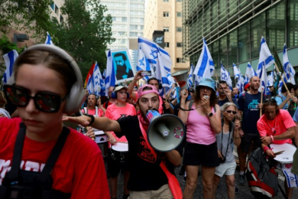 Israelis throng train stations, block roads to protest judicial reforms.jpg Israelis throng train stations, block roads to protest judicial reforms.jpg