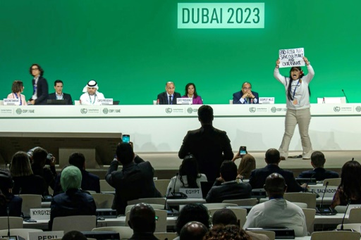UN climate summit to run overtime as fury mounts on fossil fuels