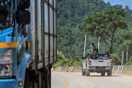 Myanmar truckers slog on as conflict clogs trade highway.jpg Myanmar truckers slog on as conflict clogs trade highway.jpg