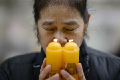 Live-streamed prayers for stressed S. Korean exam parents.jpg
