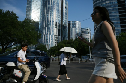 Beijing during a 2023 heatwave, one of a series of extreme weather events endured by China in recent years - GREG BAKER (AFP)