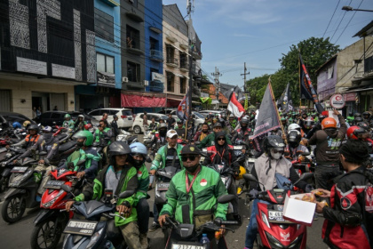 Gig economy drivers protested in Indonesia demanding a 10 percent cap on commission fees - JUNI KRISWANTO (AFP)