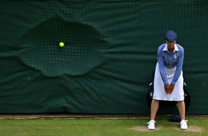 Line judges have been part of the furniture at Wimbledon for nearly 150 years - ANDREJ ISAKOVIC (AFP)