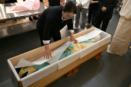 Growing numbers are finding work in the business of death as South Korea undergoes massive demographic change - Jung Yeon-je (AFP)