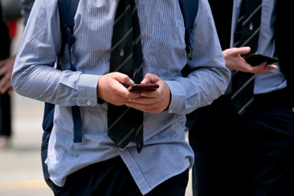 Australia will from December 10 force social media platforms including Facebook, Instagram and Tiktok to remove users under the age of 16 - William WEST (AFP)