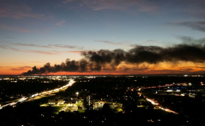 Smoke rose from the site of the UPS cargo plane crash - LEANDRO LOZADA (AFP)