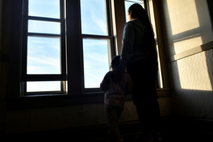 Ecuadorian asylum seeker Nina worries about federal immigration agents in Minneapolis taking her away from her young daughter - Octavio JONES (AFP)